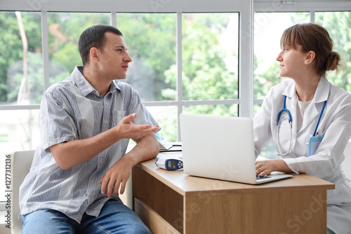 Female doctor working with ...