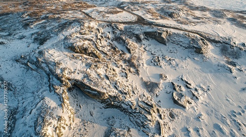 Snow-Covered Rocky Landscape with Aerial View of Winter Scene