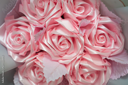 Konstfotografi Beautiful pink ribbon roses arranged in a delicate bouquet
