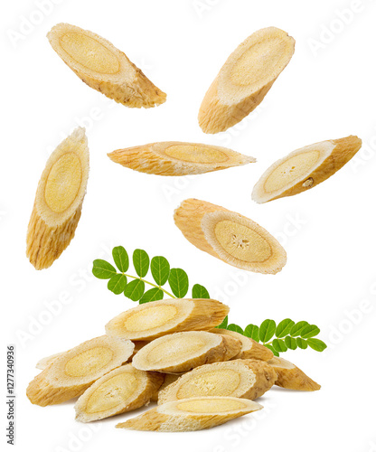 Fotografie frequently-used traditional Chinese herbal medicine astragalus slices with green leaves