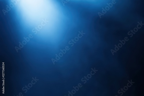 Midnight blue background with smooth texture and blurred white spotlight