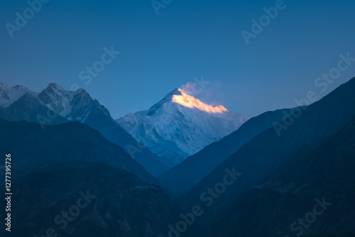 Rakaposhi, also known as Dumani, is a mountain in the Karakoram range in Gilgit-Baltistan, Pakistan. photo