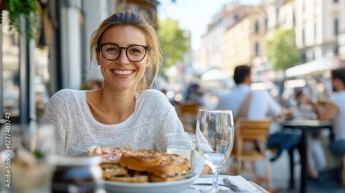 Fototapeta Naklejka Na Ścianę i Meble -  Savoring prosciutto panini at a charming cafe in Bologna