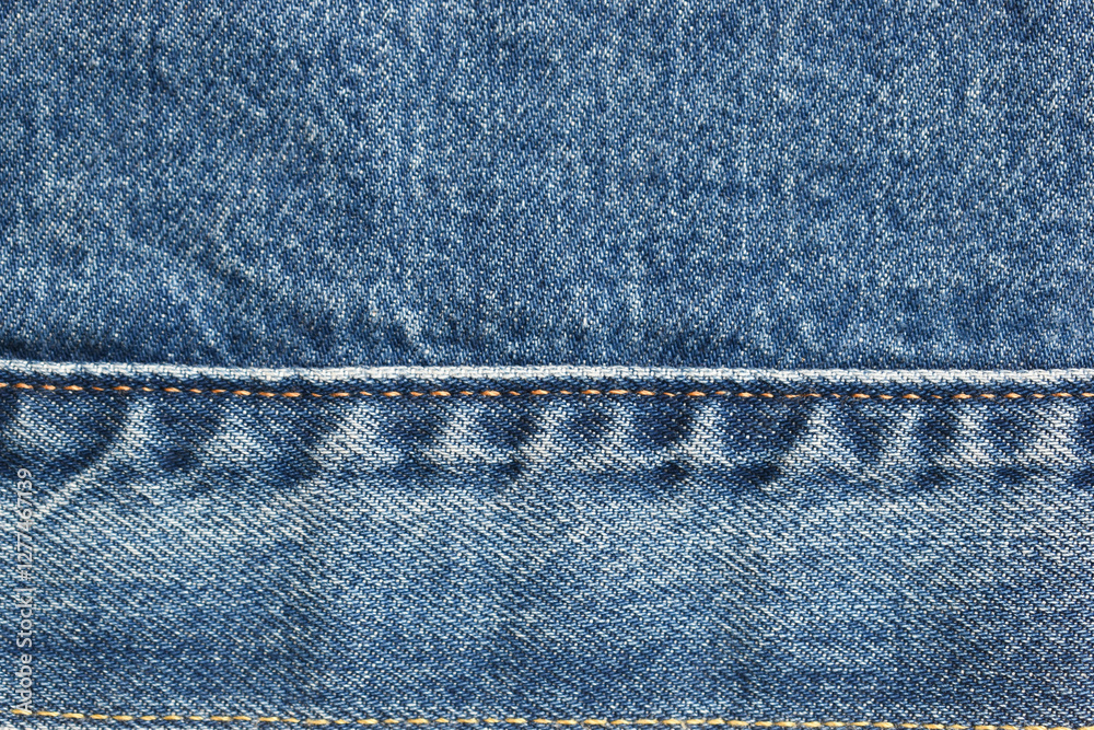 seam of blue denim texture background, jean fashion style seam of blue denim texture background, jean fashion style