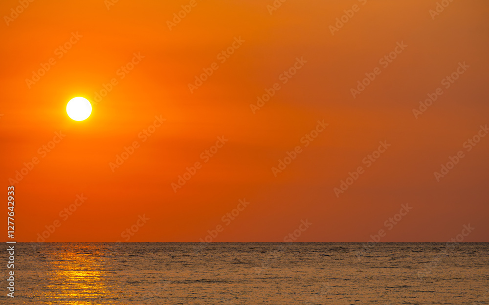 Nature sunset sky, the sun rises on the horizon, colorful sky at sea , nature concept background. Nature sunset sky, the sun rises on the horizon, colorful sky at sea , nature concept background.