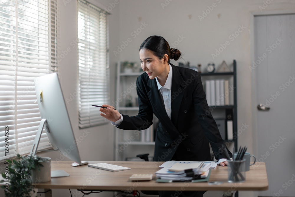 attractive business asian woman working of reading Documents accounting file financial report, tax invoice on her documents project with laptop computer in the workplace office.
attractive business asian woman working of reading Documents accounting file financial report, tax invoice on her documents project with laptop computer in the workplace office.
