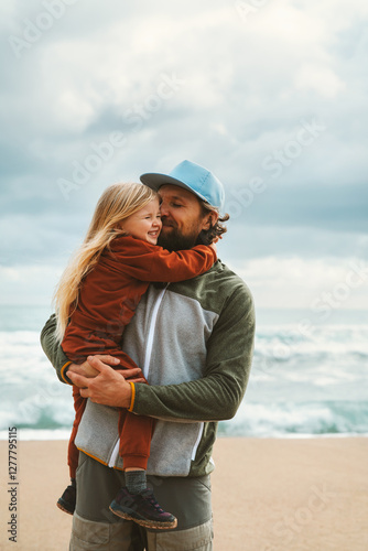 Father and daughter hugging family lifestyle outdoor child girl with daddy together walking on the beach summer vacations parent love happy moments candid emotions Fathers day holiday