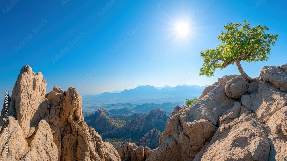 Naklejka premium A panoramic view of a mountain range with jagged peaks stretching across the horizon, emphasizing the grandeur and vastness of nature.