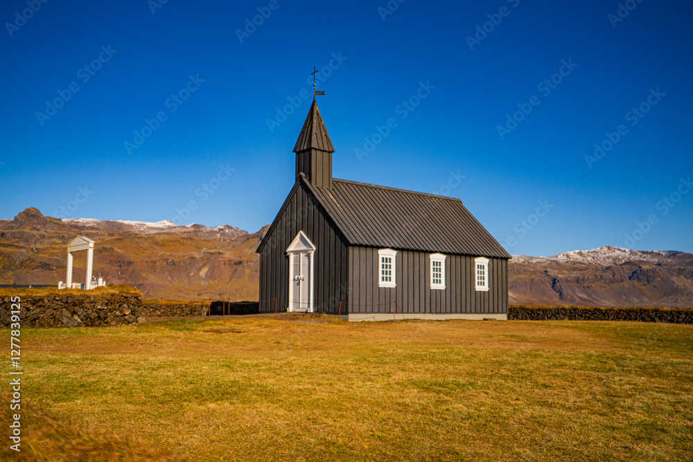 The Búðakirkja Church is a small wooden church erected on the southern shore of the Snæfellsnes Peninsula in Iceland. The Búðakirkja Church is a small wooden church erected on the southern shore of the Snæfellsnes Peninsula in Iceland.