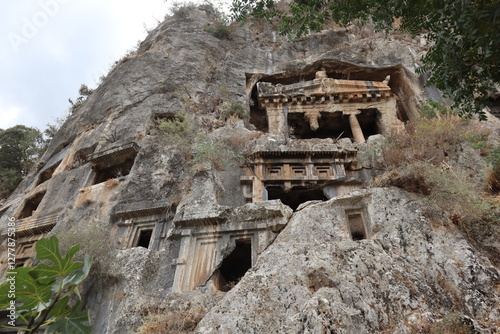 View of the Tomb of Amyntas in Fethiye, Mugla, Turkey. The Lycian Rock Tombs at ancient Telmessos currently in Fethiye is a popular tourist attraction in Turkey.