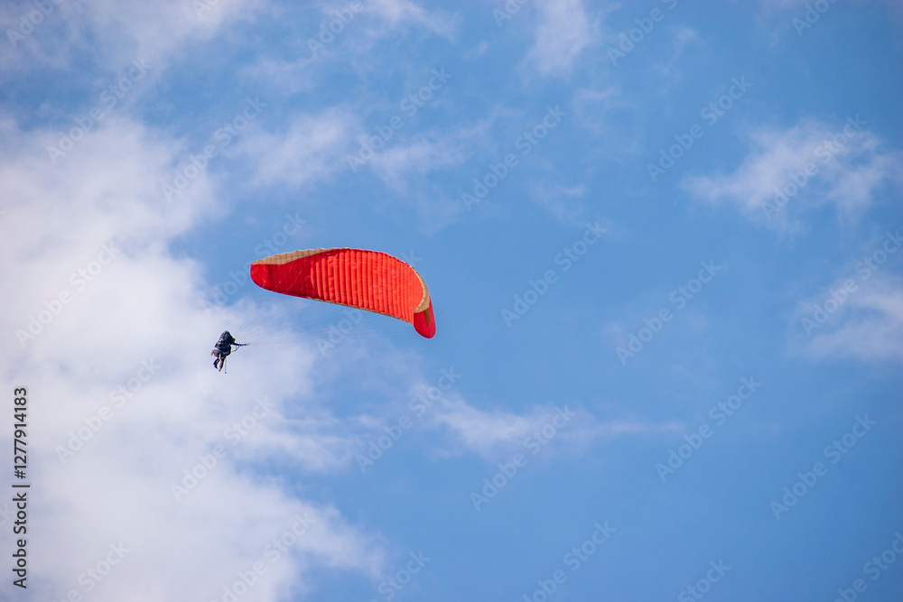 Paragliding over the clouds sunset view at Bir Billing Himachal Pradesh India. Clouds in the sky