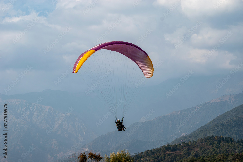 Paragliding over the clouds sunset view at Bir Billing Himachal Pradesh India. Clouds in the sky, Paragliding over the clouds sunset view at Bir Billing Himachal Pradesh India. Clouds in the sky,