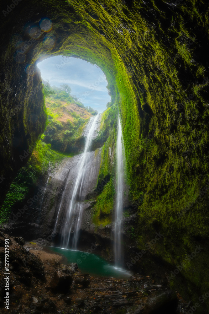 Fototapeta premium Madakaripura Waterfall is the tallest waterfall in Java and the second tallest waterfall in Indonesia.