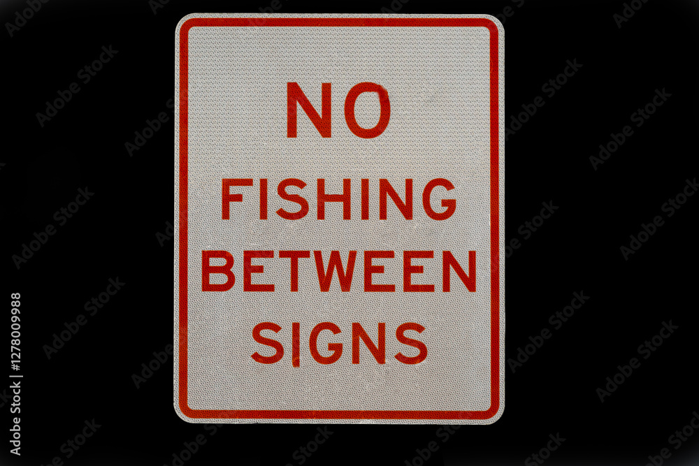 No Fishing Between Signs isolated on a black background. No Fishing Between Signs isolated on a black background.