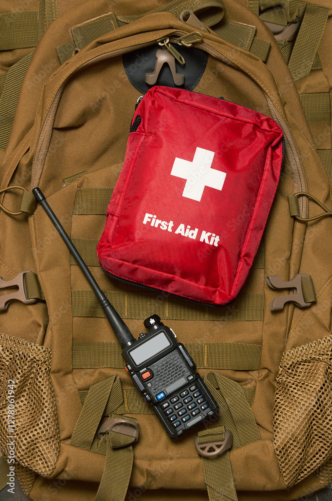 Naklejka premium First Aid Kit on army backpack