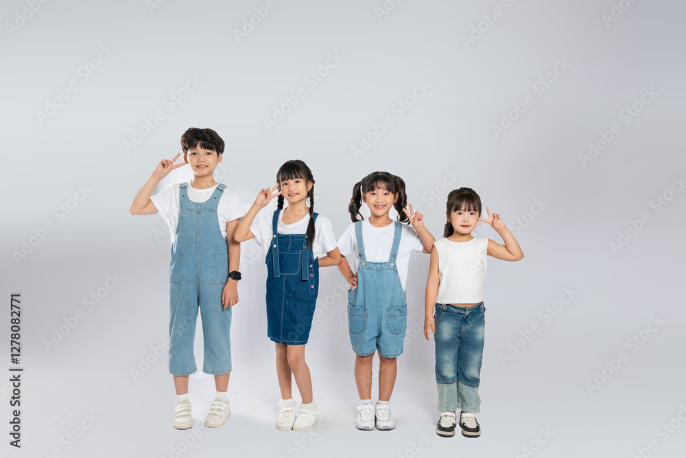 Fototapeta premium group image of cute asian kids posing on white background
