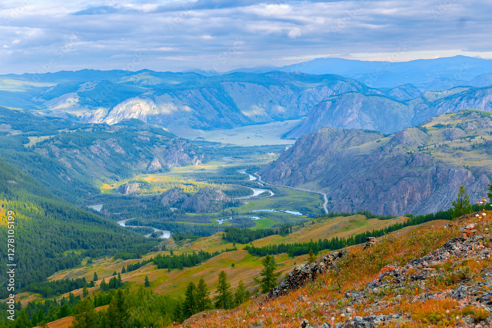 Beautiful meanders of winding river in Altay mountains, Russia - stunning landscape and lush valleys Beautiful meanders of winding river in Altay mountains, Russia - stunning landscape and lush valleys