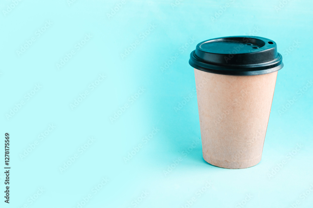 takeaway coffee cup on blue background. Copy space for the text. Minimal concept takeaway coffee cup on blue background. Copy space for the text. Minimal concept