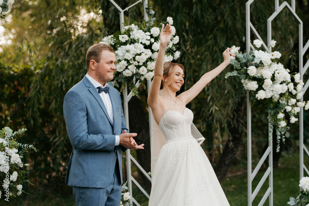 wedding ceremony of the newlyweds on the glade