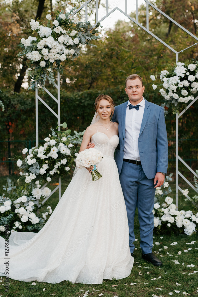 wedding ceremony of the newlyweds on the glade