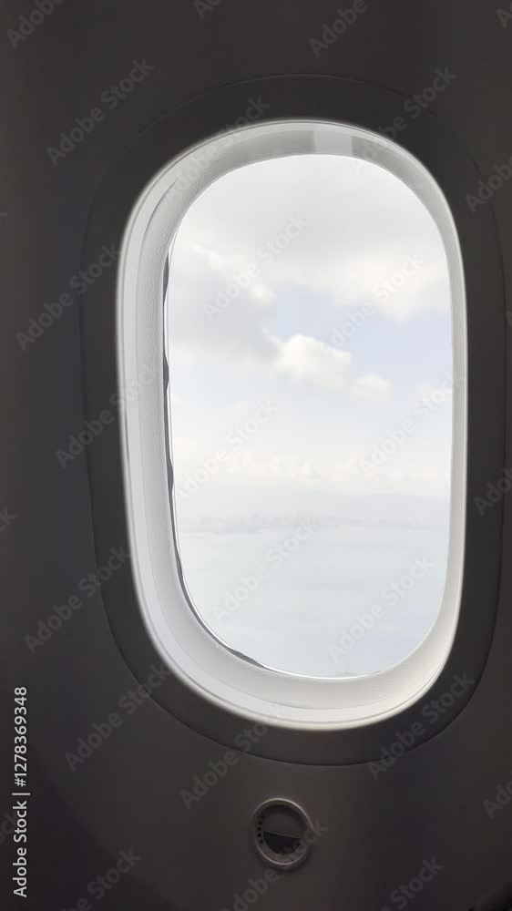The scene outside the window when the plane is about to land in Fukuoka, Japan The scene outside the window when the plane is about to land in Fukuoka, Japan