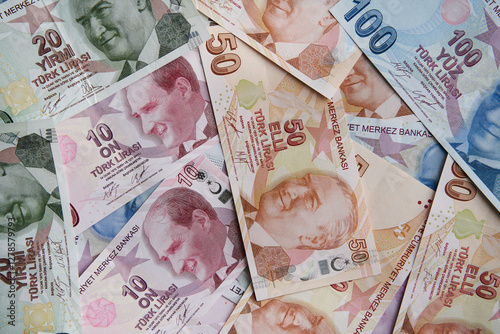 Fototapeta Naklejka Na Ścianę i Meble -  Turkish money financial crisis symbol concept shooting
