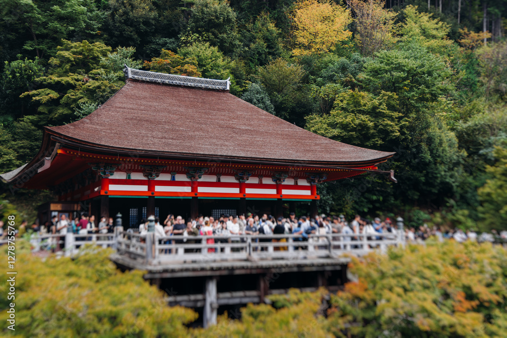 Fototapeta premium Kiyomizu-dera buddhist temple in Kyoto prefecture, Japan, Higashiyama ward, autumn fall view with mountains, Kyoto streets and skyline, shrine and pagoda, travel to Japan, Kansai region
