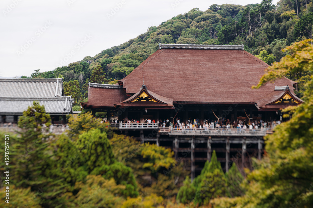 Kiyomizu-dera buddhist temple in Kyoto prefecture, Japan, Higashiyama ward, autumn fall view with mountains, Kyoto streets and skyline, shrine and pagoda, travel to Japan, Kansai region Kiyomizu-dera buddhist temple in Kyoto prefecture, Japan, Higashiyama ward, autumn fall view with mountains, Kyoto streets and skyline, shrine and pagoda, travel to Japan, Kansai region