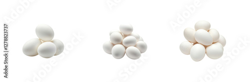 Fresh White Eggs Piled in Little Groups on a Clean Background