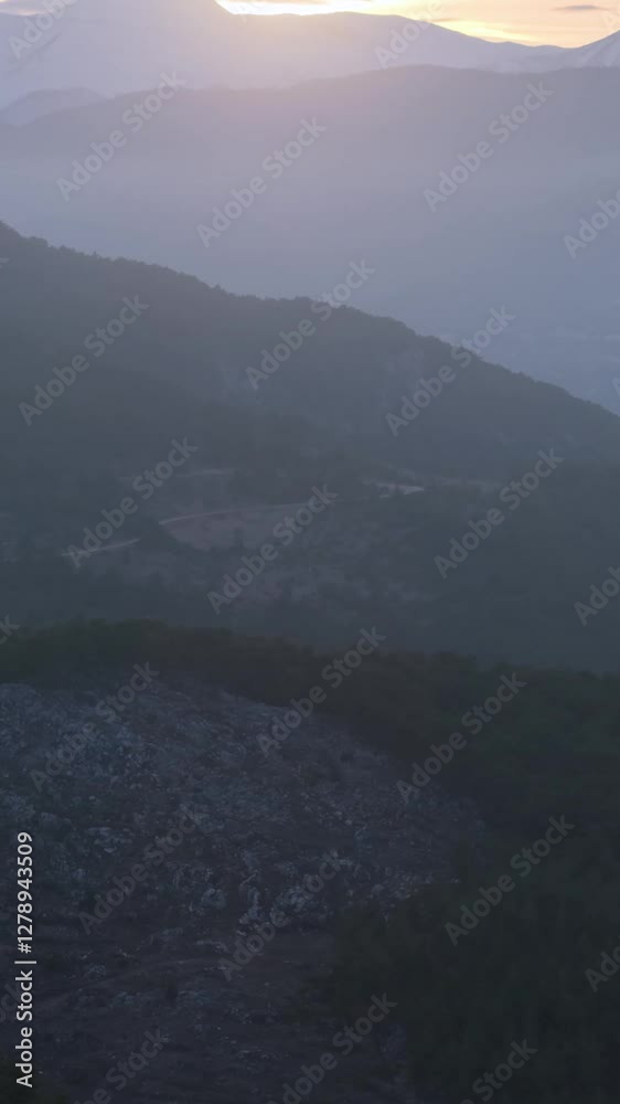 Vertical Beydağları vista, professional vertical telephoto drone shot, Beydağları mountains at sunset, Antalya, Turkey. Vertical Beydağları vista, professional vertical telephoto drone shot, Beydağları mountains at sunset, Antalya, Turkey.