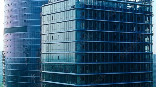 Aerial view of modern glass curtain wall building and office building