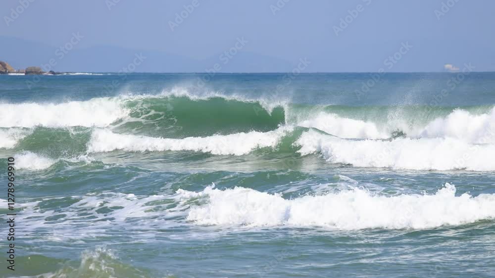 the big clear blue sea wave rushing to the beach, wind blowing, 4K, real time, Hainan, China the big clear blue sea wave rushing to the beach, wind blowing, 4K, real time, Hainan, China