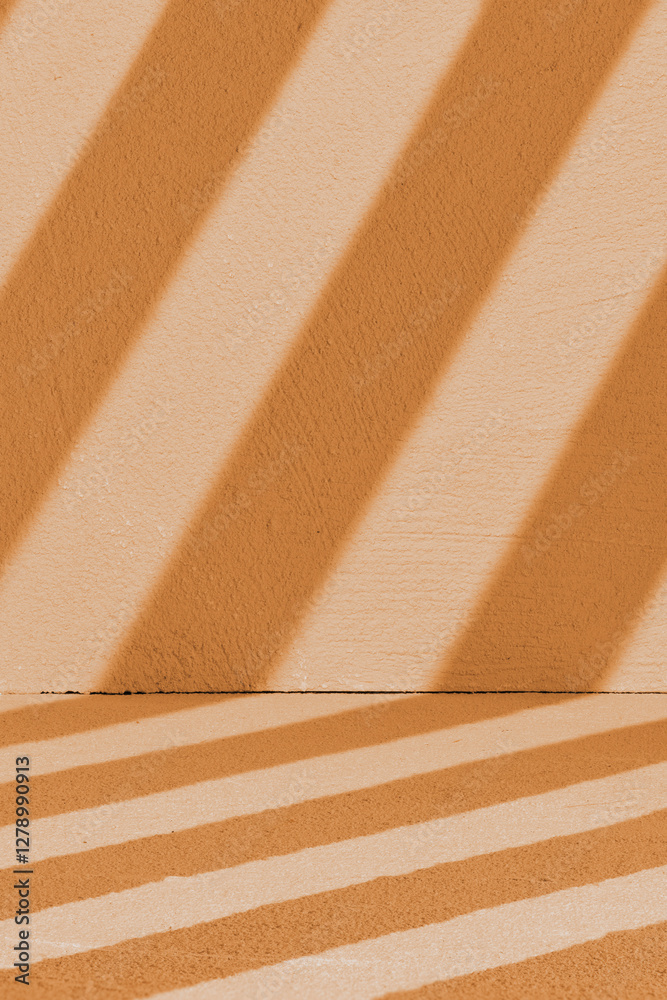 Fototapeta premium Warm diagonal stripes forming geometric shadows. Peach tones evoke calm with minimalistic, warm lighting.