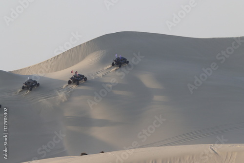 Climbing the dunes in Insland Sea with the buggys