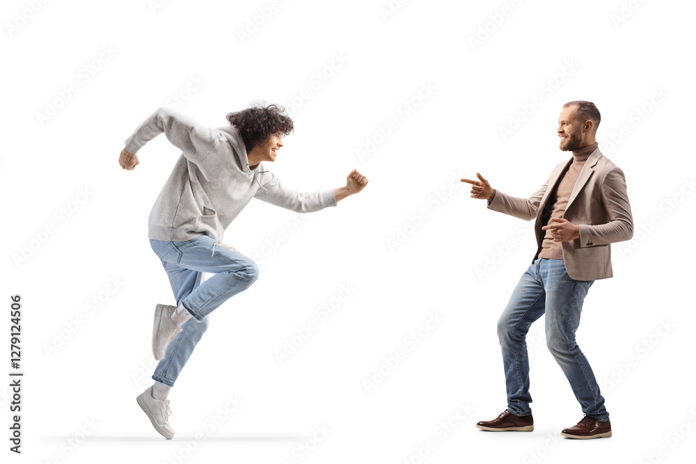 Fotografie Young cheerful man dancing with a friend