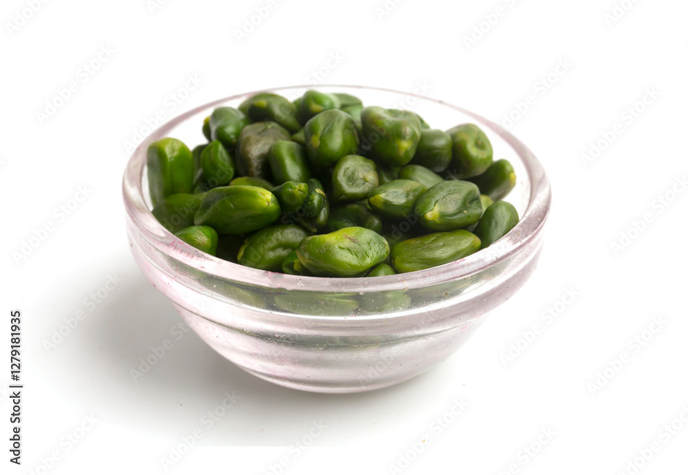 raw peeled pistachios in a bowl raw peeled pistachios in a bowl
