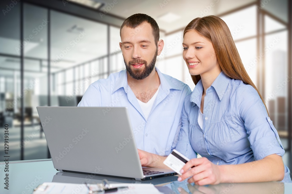 Business team working together in office. Business team working together in office.