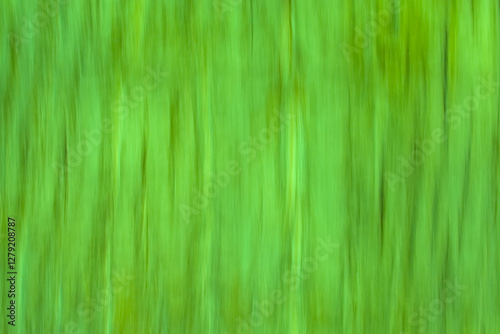Foto Soft motion blur background with vertical lines in lightgreen tints through inte