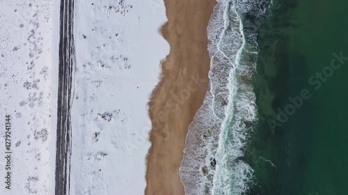 Aerial view to beautiful beach covered with snow at winter near to Sozopol, Burdas, Bulgaria