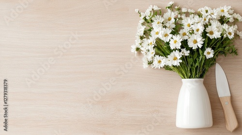 Wallpaper Mural White daisies in vase on wood, knife nearby, copy space Torontodigital.ca