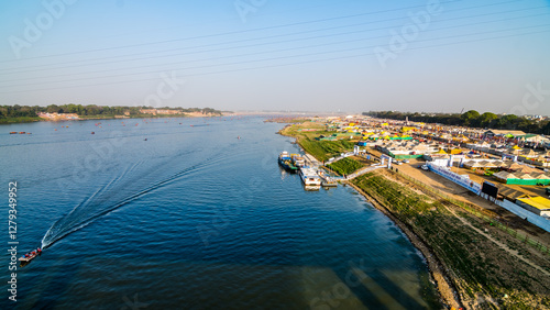 Aerial view of tent city and Triveni Sangam at The Maha Kumbh Mela in Prayagraj, Uttar Pradesh, India. The Mahakumbh Mela is a Hindu festival that happens every 12 years.