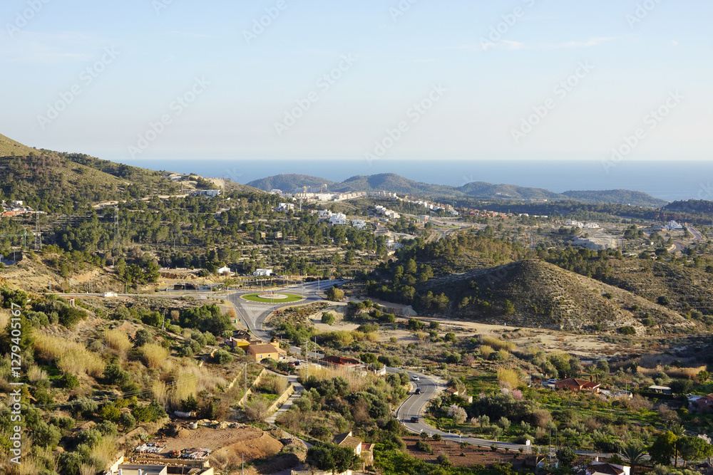 The view from Finestrat village in the direction of Benidorm and seaside, Spain The view from Finestrat village in the direction of Benidorm and seaside, Spain