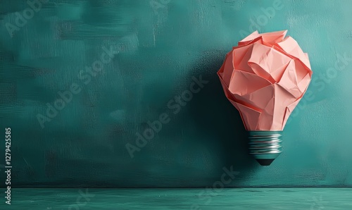 Bright Idea Concept - Innovative Light Bulb with Paper Origami Above Blackboard, Symbolizing Creativity and Solution-Finding in Education or Business