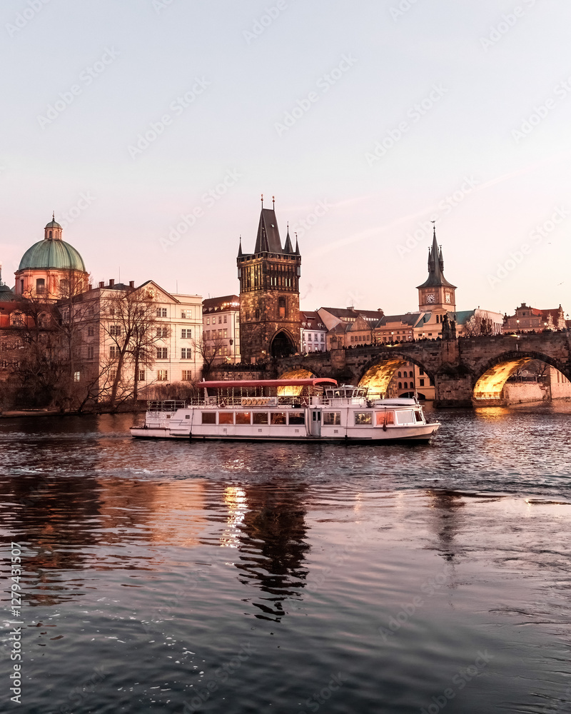 Obraz premium Sunset colors in Prague Historical Gothic Medieval castle, St. Vitus Cathedral, Charles Bridge and river Vltava boat cruise, astronomical clock, Unesco city tourism, golden hour and water reflection