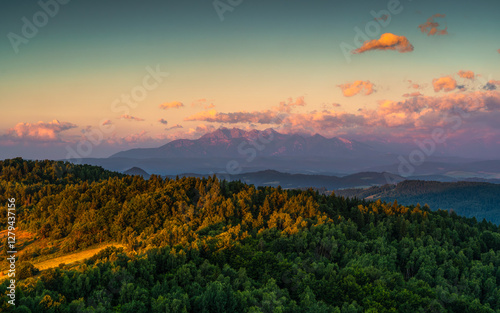 Fototapeta Naklejka Na Ścianę i Meble -  Tatra Mountains, Poland. Panorama of a mountain landscape. View from Koziarz. Sunset over the mountains