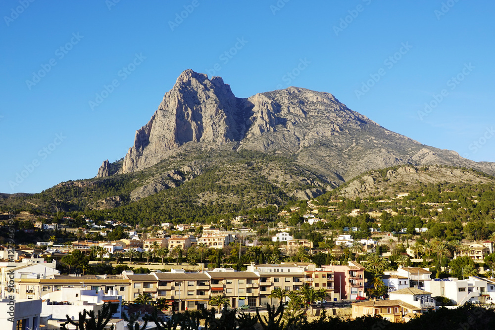 Obraz premium The panorama of Pick Puig Campana from Finestrat village, near Benidorm, Spain