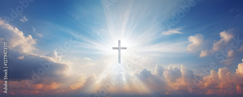 Bright sunlight shines through clouds surrounding a glowing cross in the sky during early evening