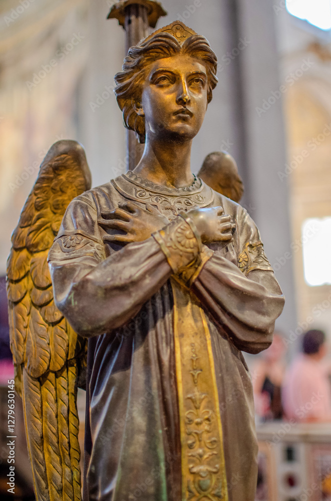 Fototapeta premium Rome, Latium, Italy - July 30th 2024: Statue of an angel located at the Basilica of San Pietro in Vincoli