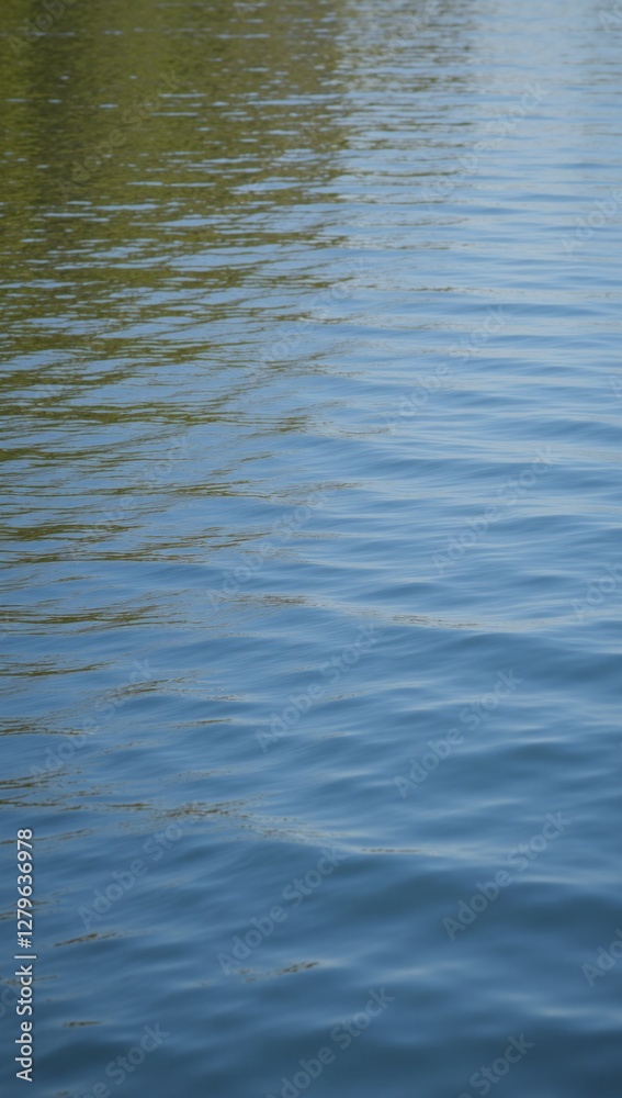 Textured image featuring a serene river scene with smooth still waters Textured image featuring a serene river scene with smooth still waters