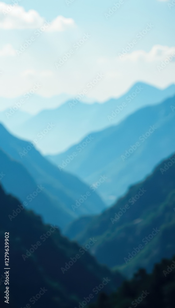 Fototapeta premium Gradated blues with blurry foggy landscape featuring misty mountains and distant clouds , fog, landscape, atmospheric
